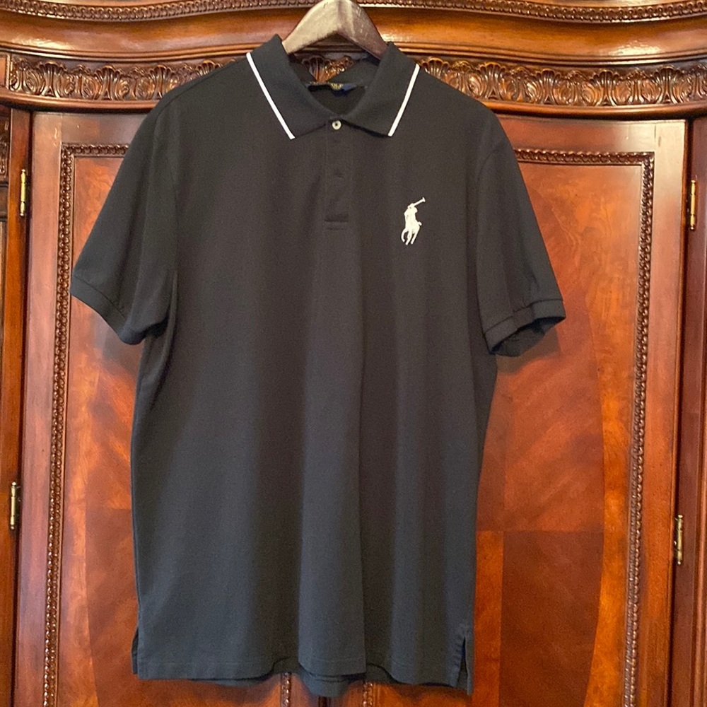 Polo by Ralph Lauren, polo shirt. Black in color. Size XL